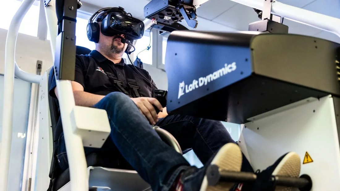man sitting in the training cockpit