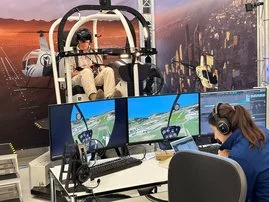 a person monitors the flying training process